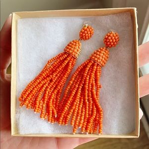 Orange tassel earrings